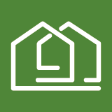 Icon mit zwei stilisierten Häusern auf grünem Hintergrund.